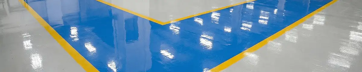 A factory floor professionally covered and marked with epoxy flooring in Phoenix, AZ