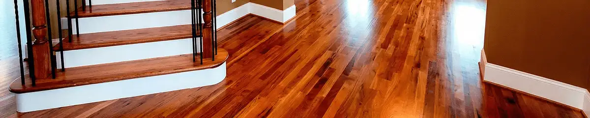 Base floor of a staircase with professionally restored wood flooring in Phoenix AZ
