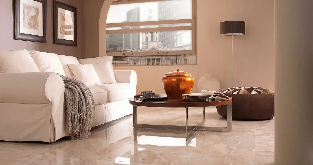 Modern living room with professionally installed marble flooring, a beige sofa, coffee table in Phoenix, AZ